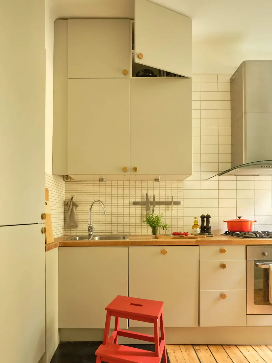 A Lush Balcony and Charming Rooms in a Late 19th Century Apartment 22 kitchen gray-green cabinets