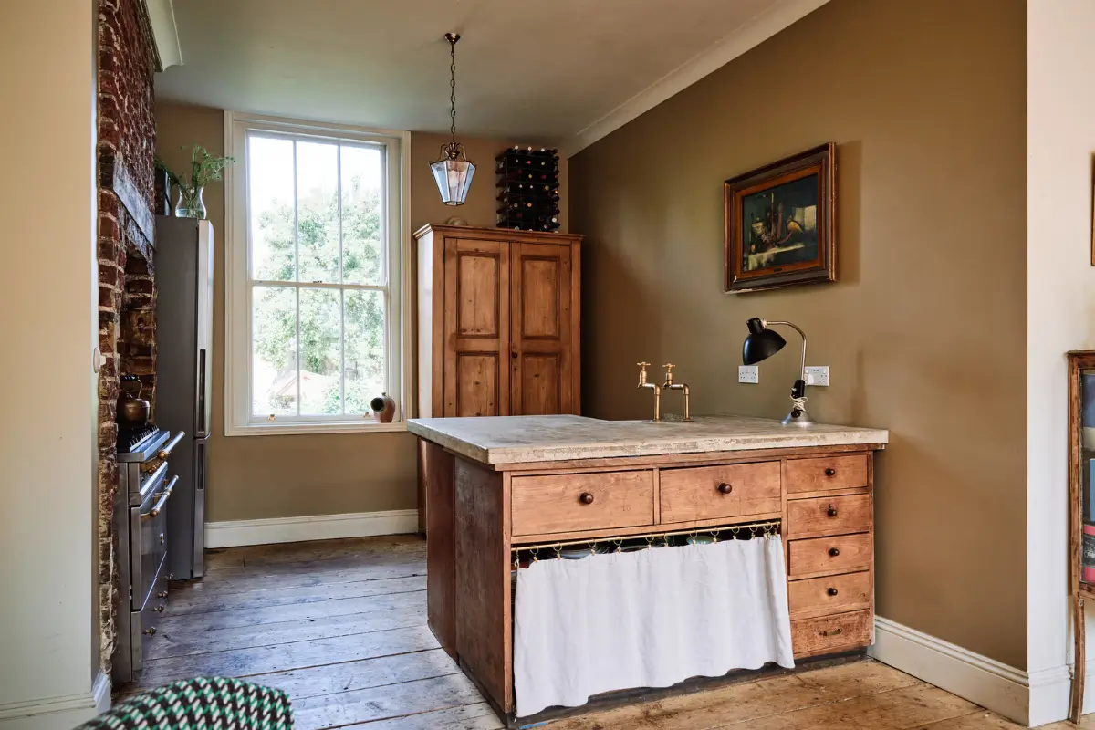 Restored Features in a Charming Georgian Apartment in London 7 kitchen island concrete worktop