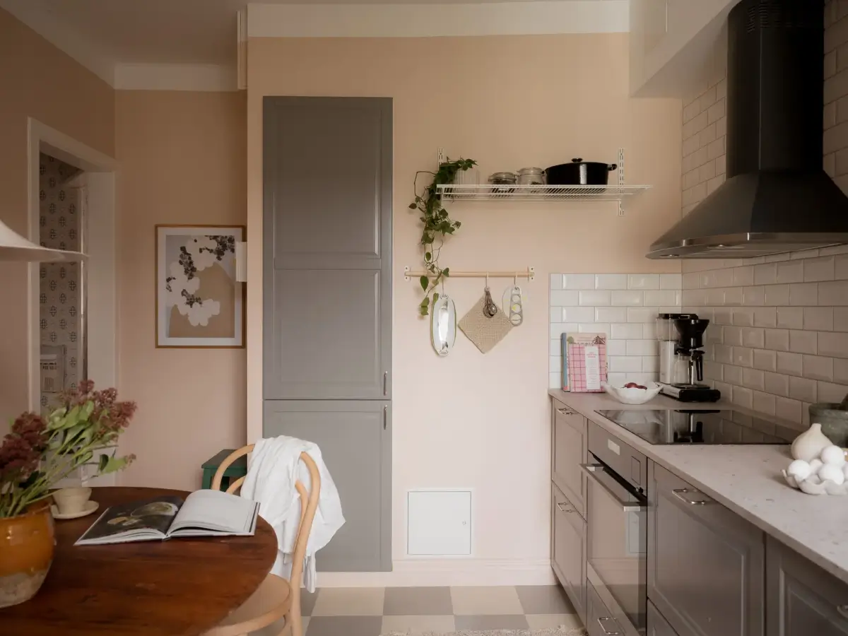 A Cozy Apartment with Exposed Brick and Period Details 23 kitchen light pink walls checkerboard floor