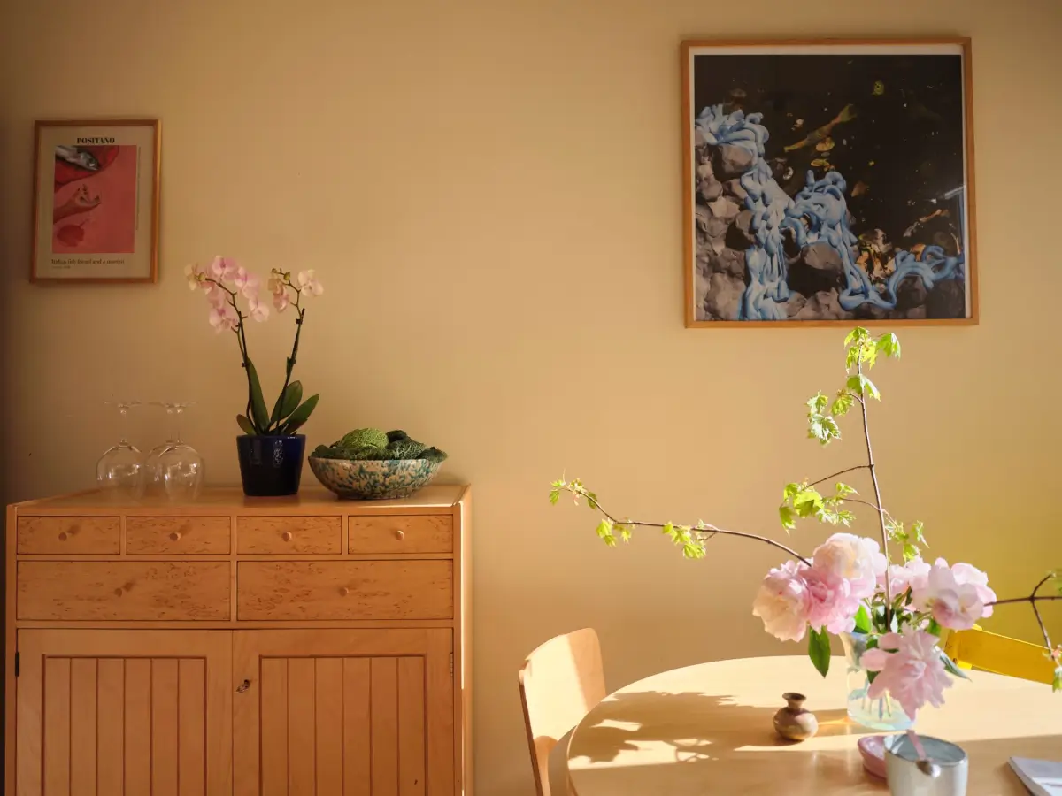 Soft Beige Interiors with the Occasional Bright Color Pop in Stockholm 17 kitchen table detail