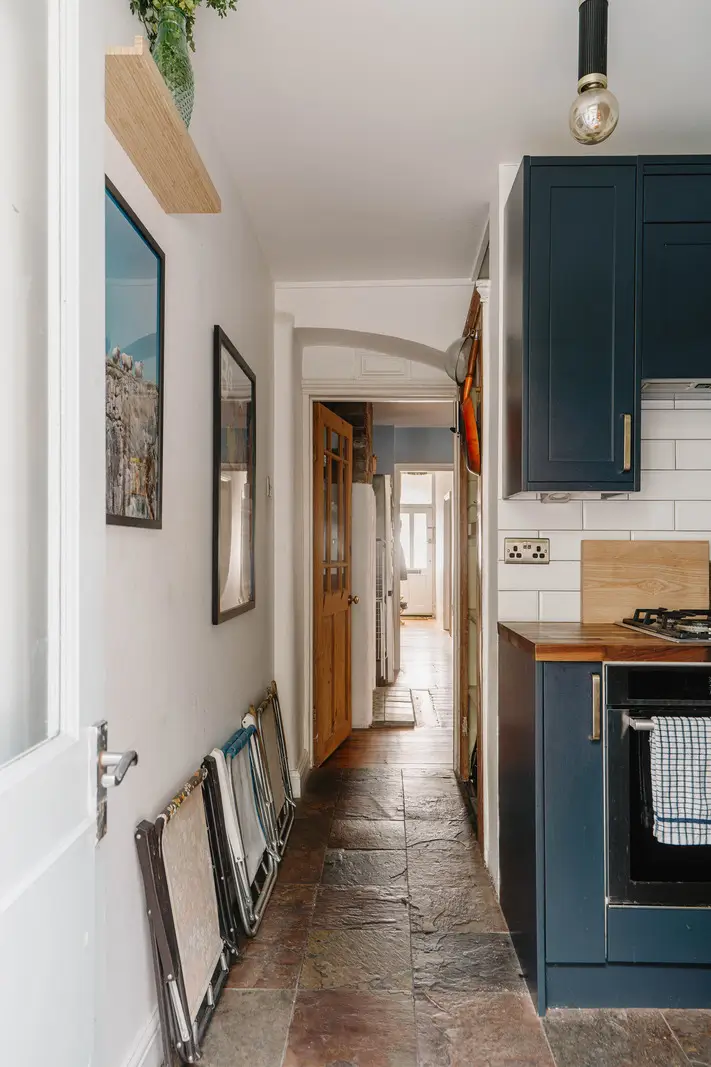 Shades of Blue and Original Details in a Victorian Garden Apartment 10 kitchen tile floor