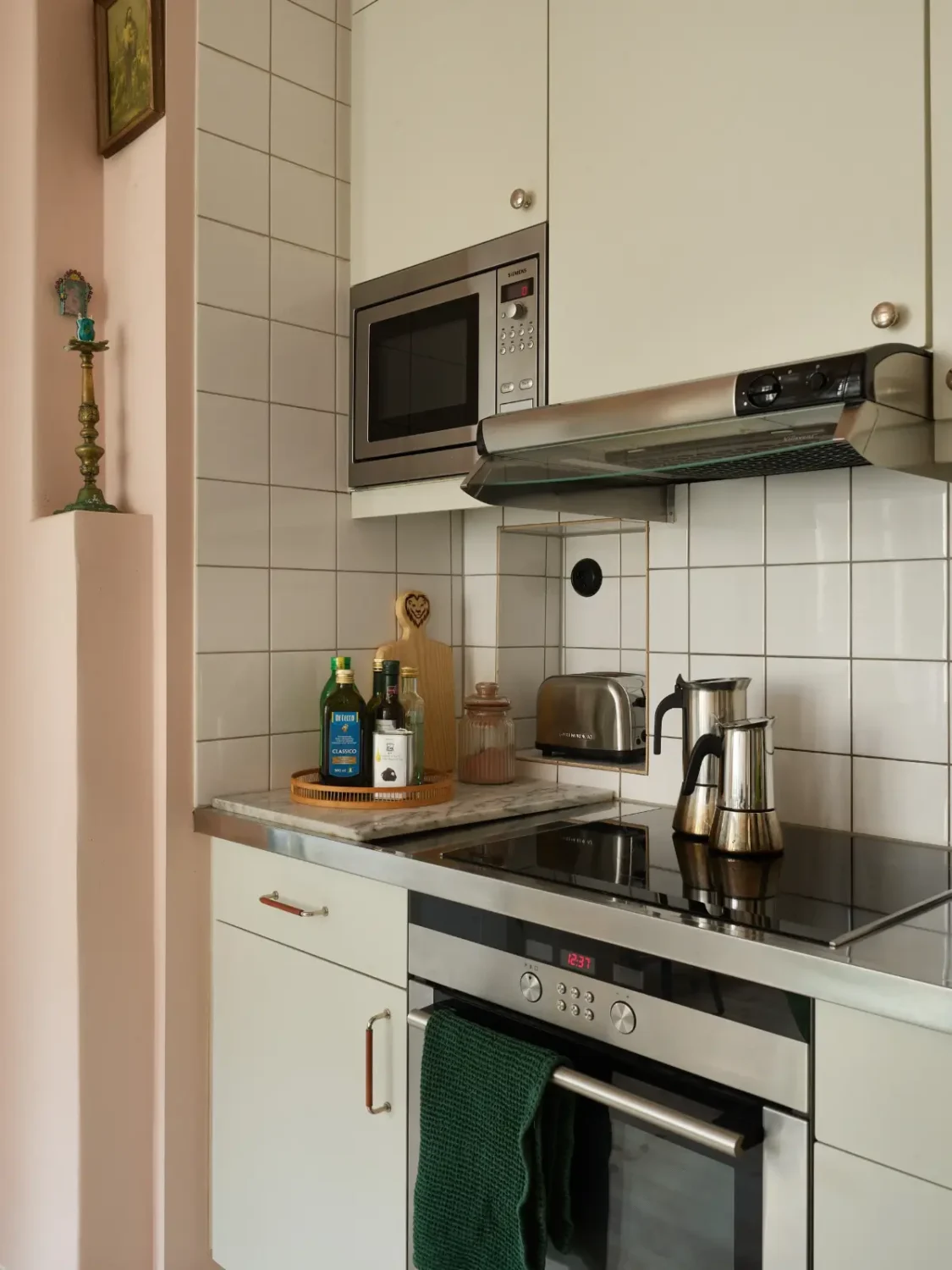 A Spacious Family Apartment with Original Details in Stockholm 15 kitchen white backsplash tiles