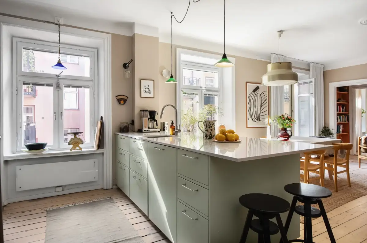 Warm Colors and an Open-Plan Living Space in a Stockholm Apartment 2 kitchen with breakfast bar