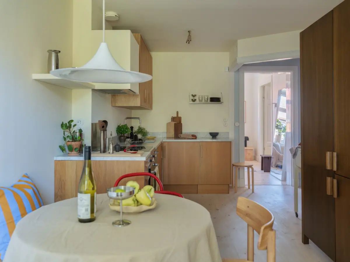 A Bright Apartment Where Historic Character Meets Contemporary Design 22 kitchen with round table