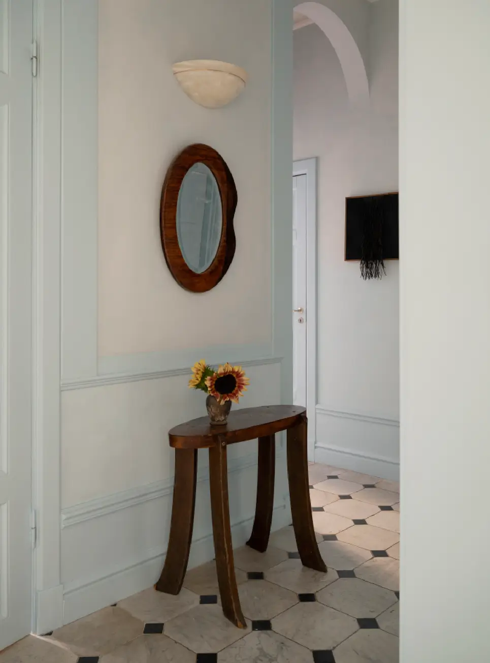 Luxurious Design and Period Features in a Stunning Stockholm Apartment 13 light blue entry hall classic floor tiles nordroom