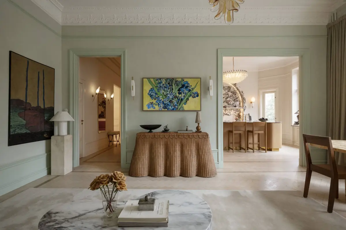 Luxurious Design and Period Features in a Stunning Stockholm Apartment 4 light blue-green walls semi-open-plan layout living room kitchen nordroom