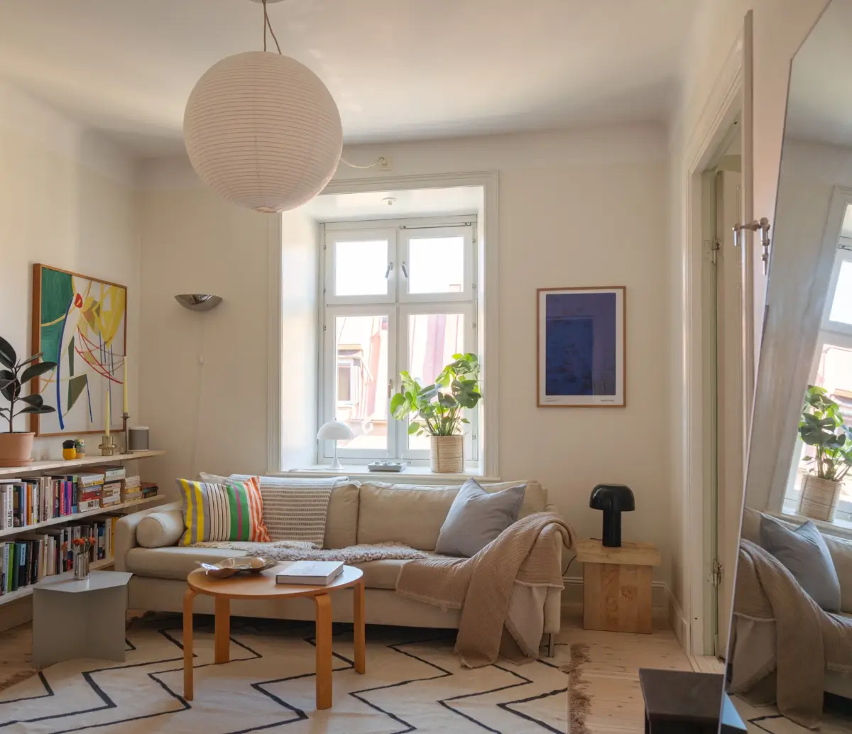 A Bright Apartment Where Historic Character Meets Contemporary Design 2 light-colored scandi living room