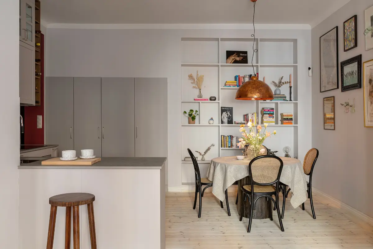 Red and Blue Color Accents in an Open-Plan Stockholm Apartment 8 light gray open-plan living space built-in shelves