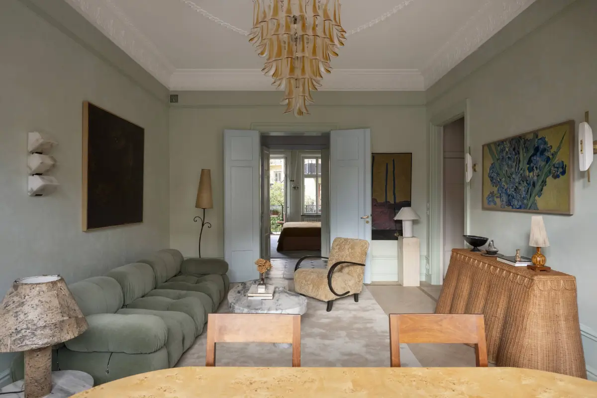 Luxurious Design and Period Features in a Stunning Stockholm Apartment 3 light green walls scandi living room double wooden doors