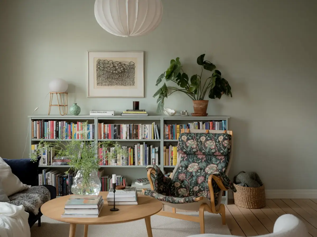 A Cozy Apartment with Exposed Brick and Period Details 4 living room bookcases