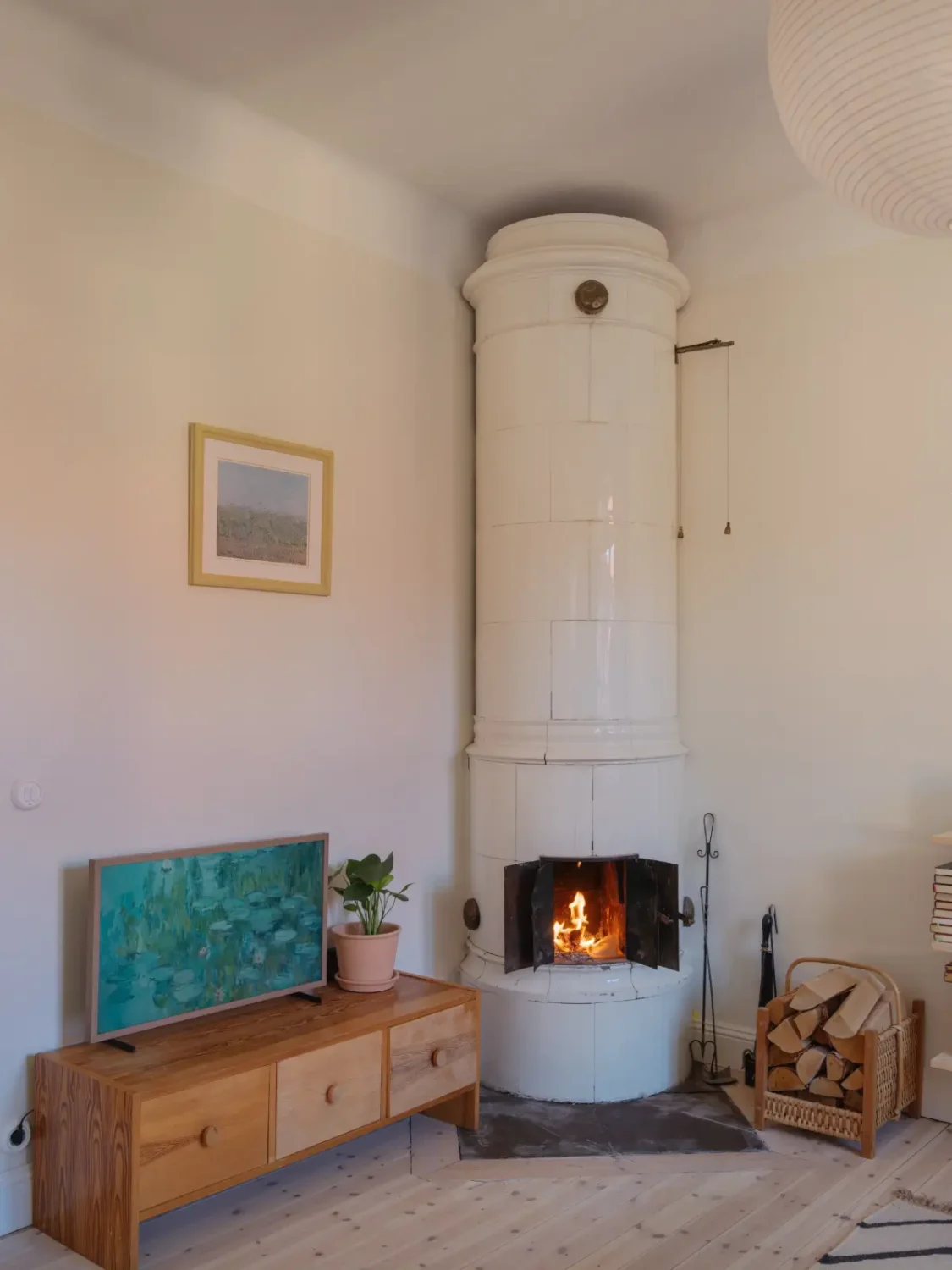 A Bright Apartment Where Historic Character Meets Contemporary Design 7 living room fireplace