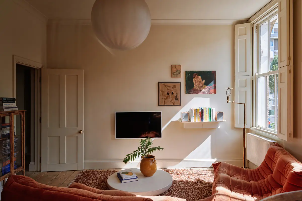 Restored Features in a Charming Georgian Apartment in London 3 living room large windows