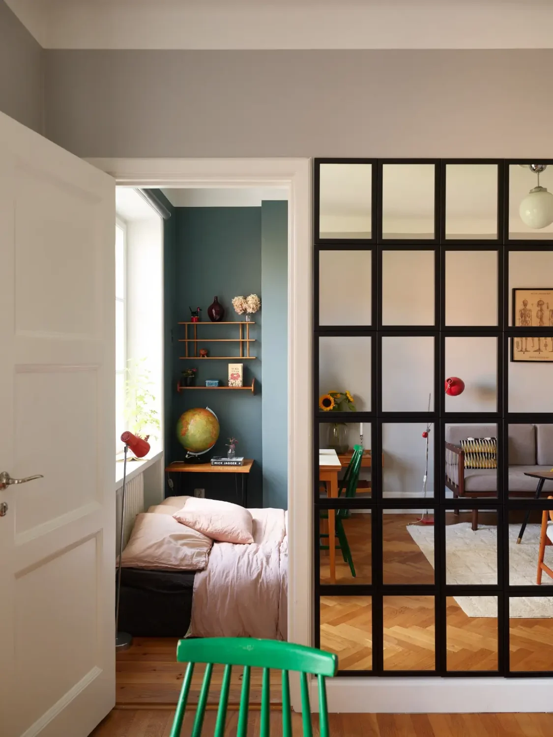 Midcentury Furniture & a Dark Blue Bedroom in a 1930s Apartment 7 living room mirror wall