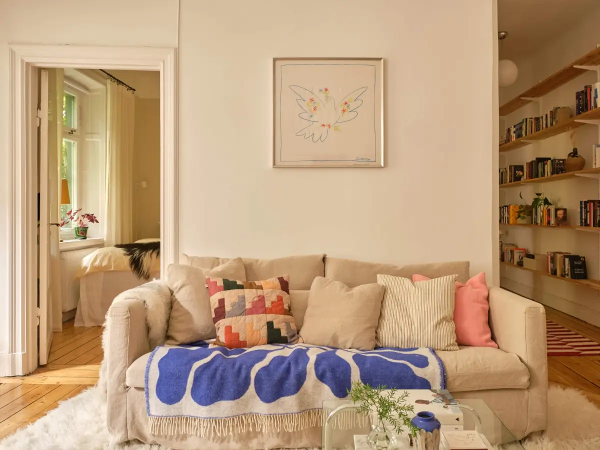 A Lush Balcony and Charming Rooms in a Late 19th Century Apartment 3 living room sofa