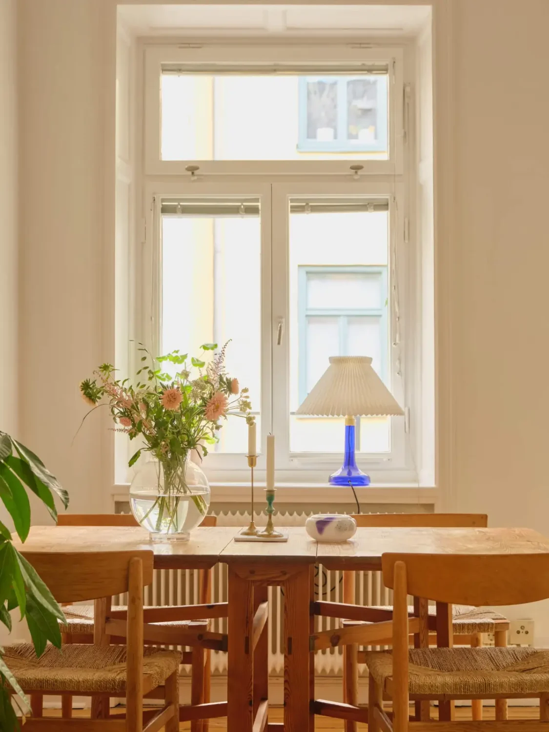A Lush Balcony and Charming Rooms in a Late 19th Century Apartment 6 living room wooden dining table
