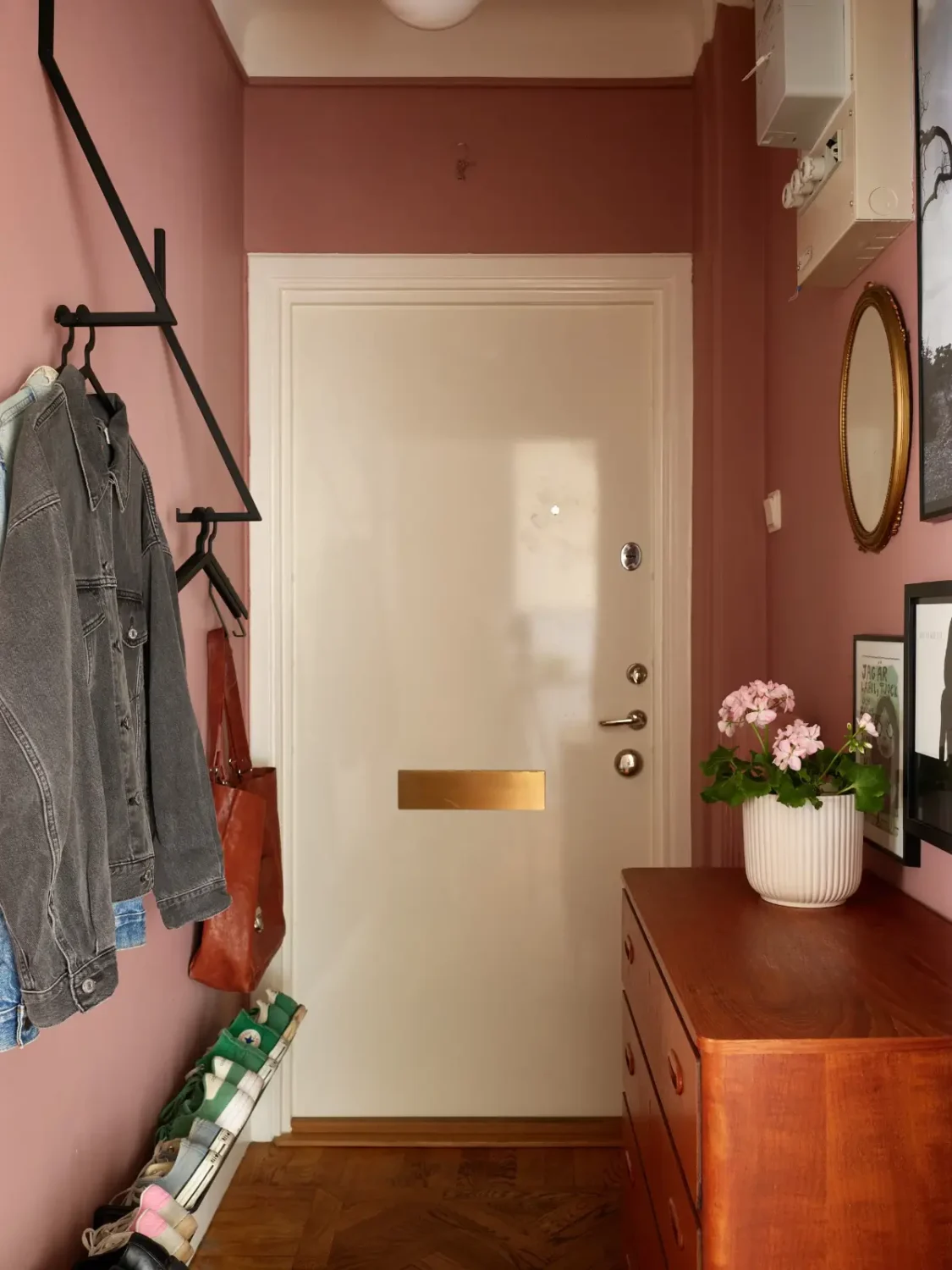 Midcentury Furniture & a Dark Blue Bedroom in a 1930s Apartment 18 narrow pink hall with shoe storage and coat rack nordroom Midcentury Furniture & a Dark Blue Bedroom in a 1930s Apartment