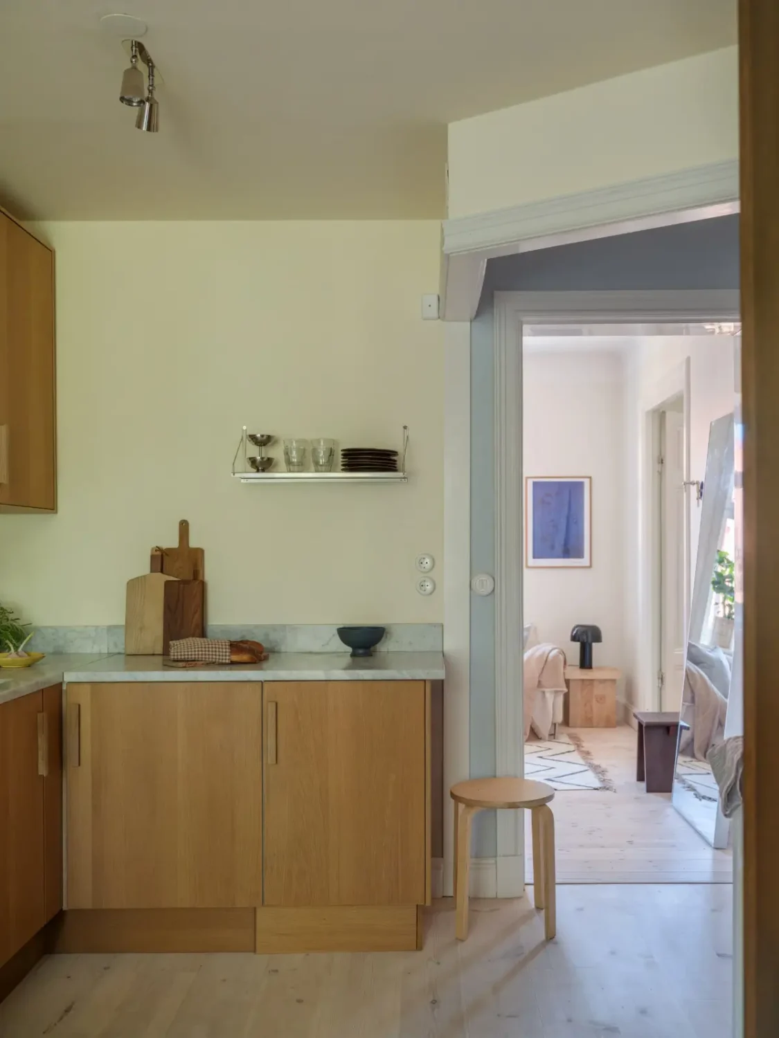 A Bright Apartment Where Historic Character Meets Contemporary Design 19 oak ikea kitchen