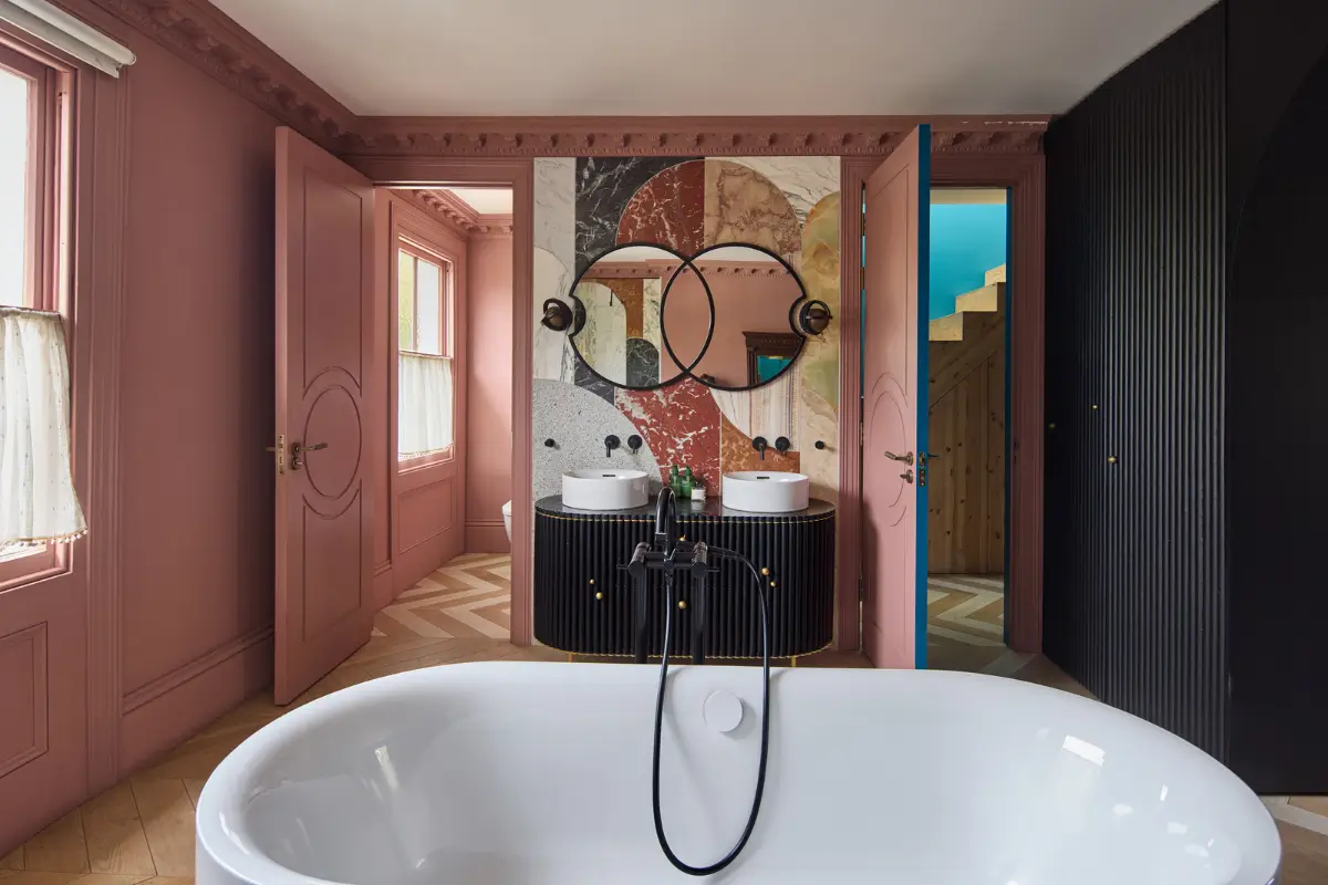 Victorian Grandeur Meets Modern Design in a Camden Square Townhouse 18 pink bathroom freestanding bath