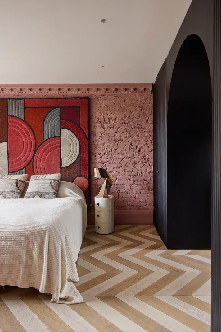 Victorian Grandeur Meets Modern Design in a Camden Square Townhouse 16 pink bedroom brick wall chevron floor