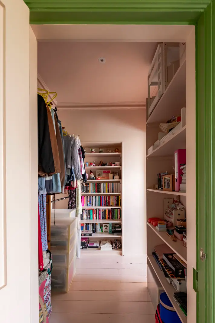 A Dramatic Color Palette in a Large Victorian Family Townhouse 25 pink room green doorframe