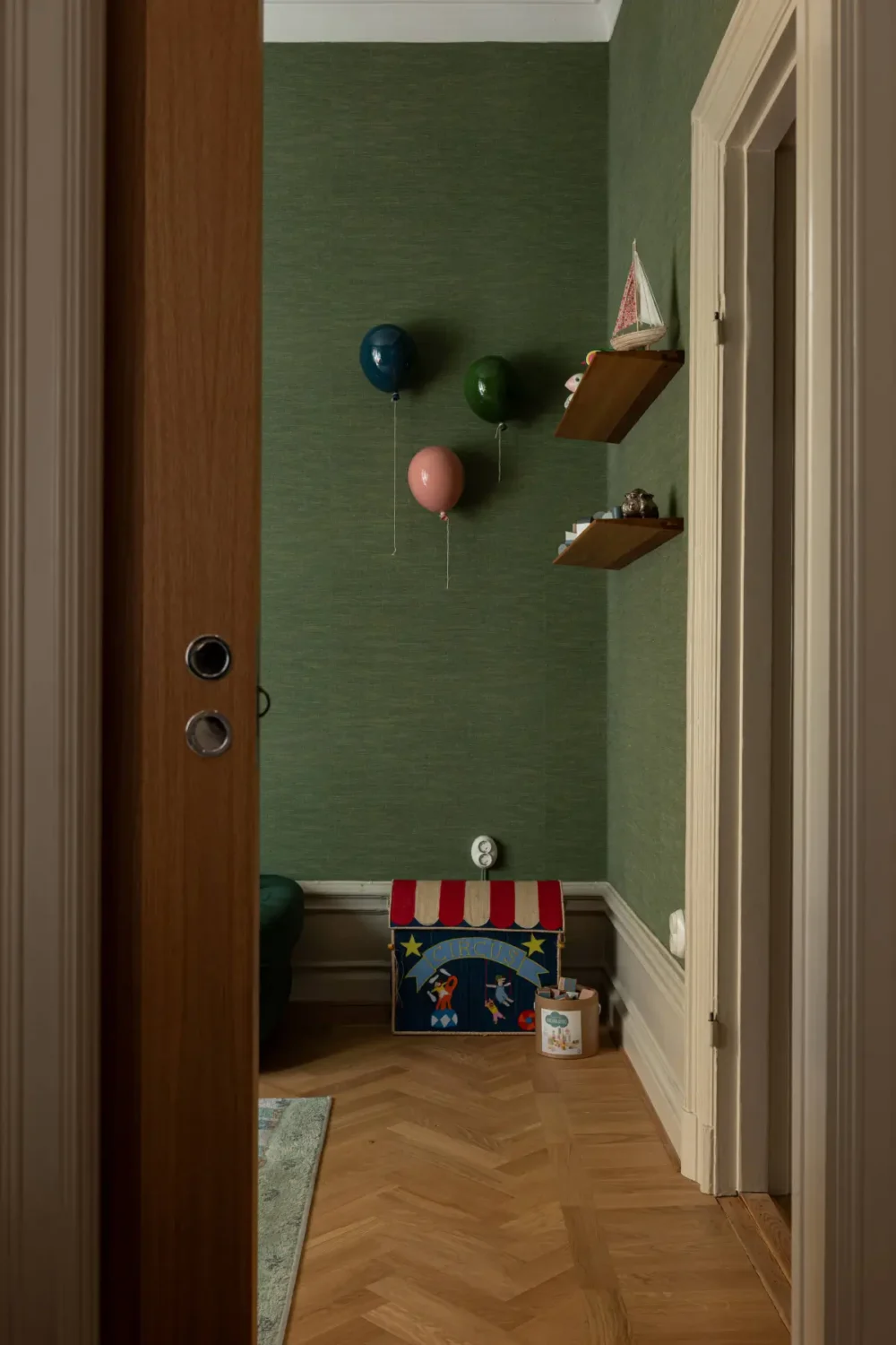 A Luxurious Family Apartment with a Dramatic Black Bathroom 14 play room dark green wallpaper