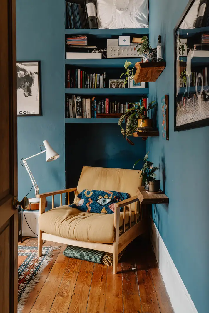 Shades of Blue and Original Details in a Victorian Garden Apartment 3 reading chair
