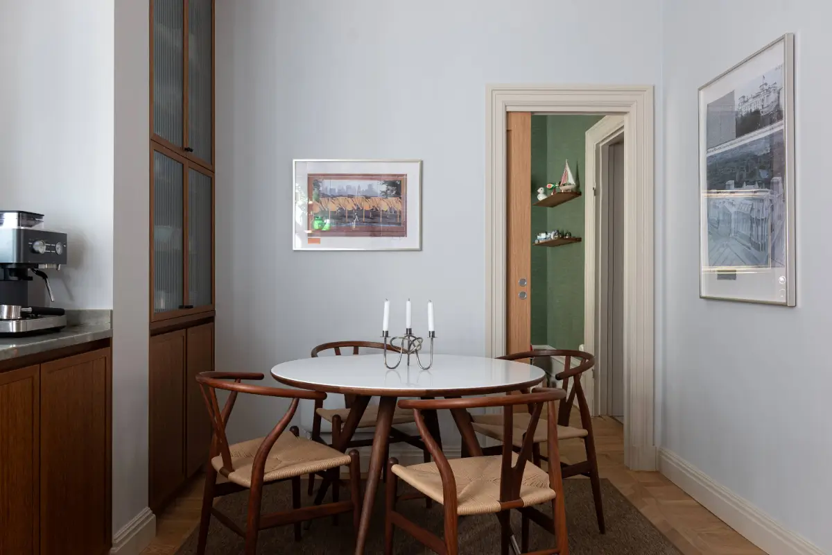 A Luxurious Family Apartment with a Dramatic Black Bathroom 13 round kitchen table