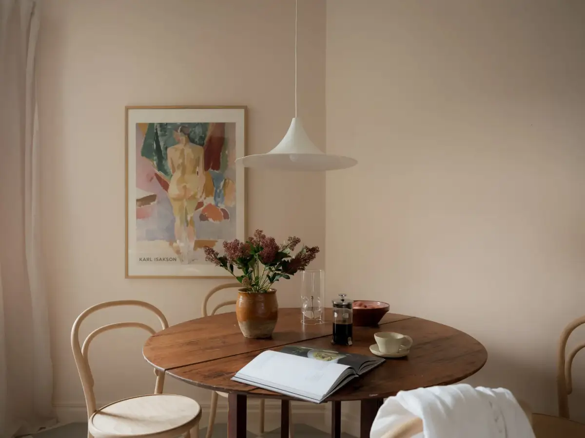 A Cozy Apartment with Exposed Brick and Period Details 22 round wooden floor