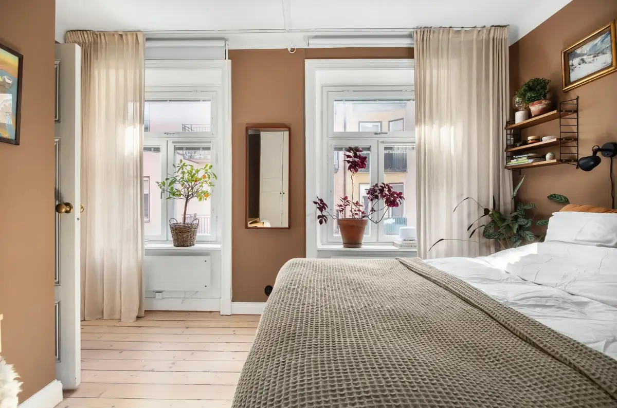 Warm Colors and an Open-Plan Living Space in a Stockholm Apartment 13 scandi bedroom terracotta walls large windows