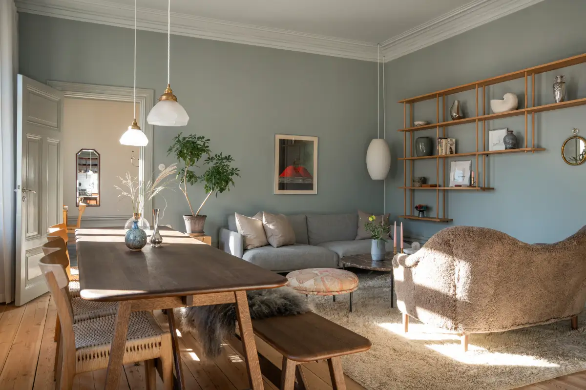 Historic Elegance and a French-Style Kitchen and Bathroom in a Stockholm Apartment 1 scandinavian living room blue-gray walls