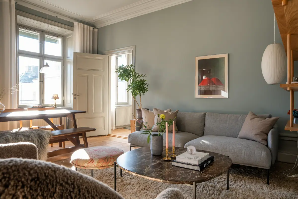 Historic Elegance and a French-Style Kitchen and Bathroom in a Stockholm Apartment 5 scandiniavian living room gray walls nordroom