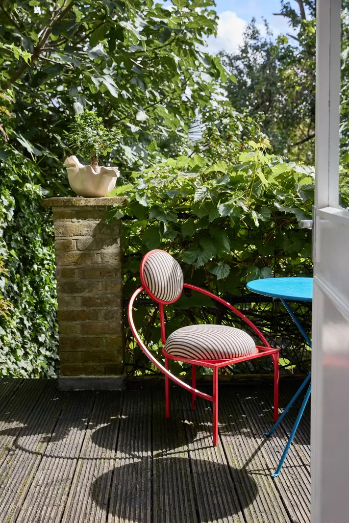 Victorian Grandeur Meets Modern Design in a Camden Square Townhouse 30 terrace colorful furniture