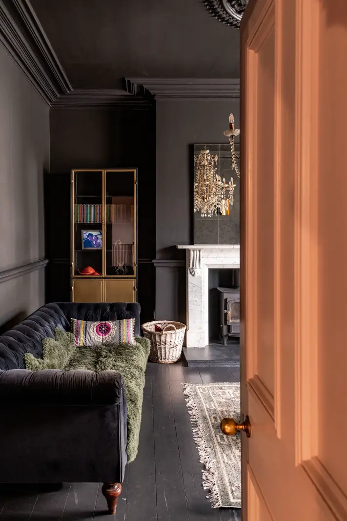 A Dramatic Color Palette in a Large Victorian Family Townhouse 4 view into black living room