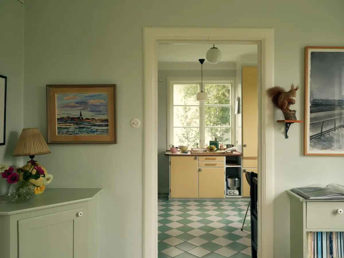 A Cheerful Color Palette in an Early 20th Century Villa in Stockholm 10 view into kitchen