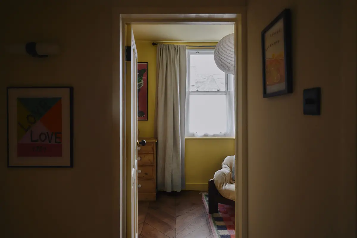 Modern Craftsmanship and Historic Charm in a London Home 22 view into nursery chevron floor