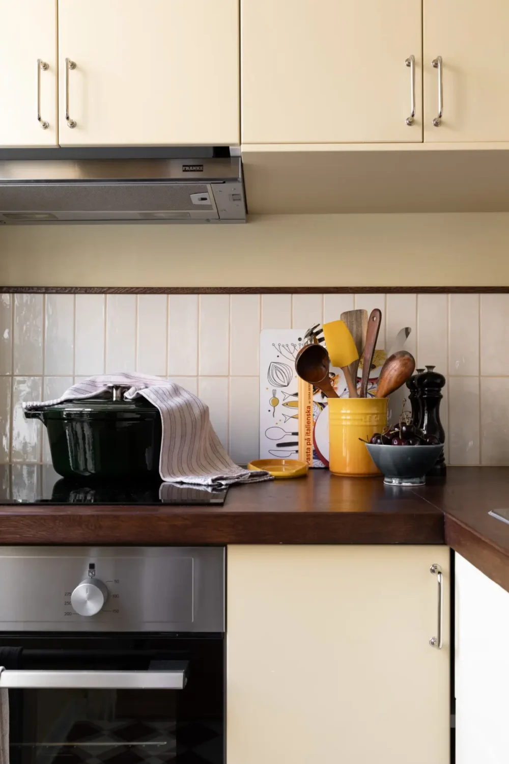 A Warm Beige Studio Apartment with a Butter-Yellow Kitchen 19 warm-beige-studio-apartment-yellow-kitchen-nordroom10