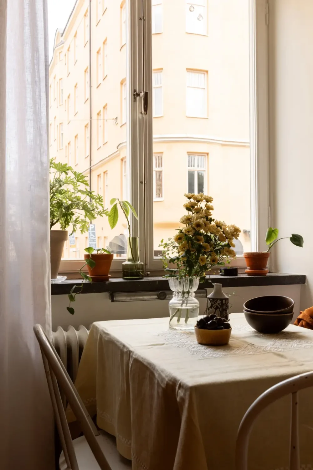 A Warm Beige Studio Apartment with a Butter-Yellow Kitchen 10 warm-beige-studio-apartment-yellow-kitchen-nordroom5