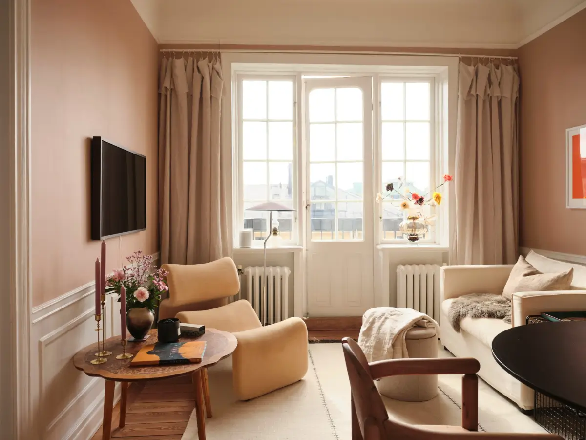 Warm Pink Walls and a Glass Room Divider in a Small Stockholm Apartment 15 warm pink walls small living room nordroom Warm Pink Walls and a Glass Room Divider in a Small Stockholm Apartment