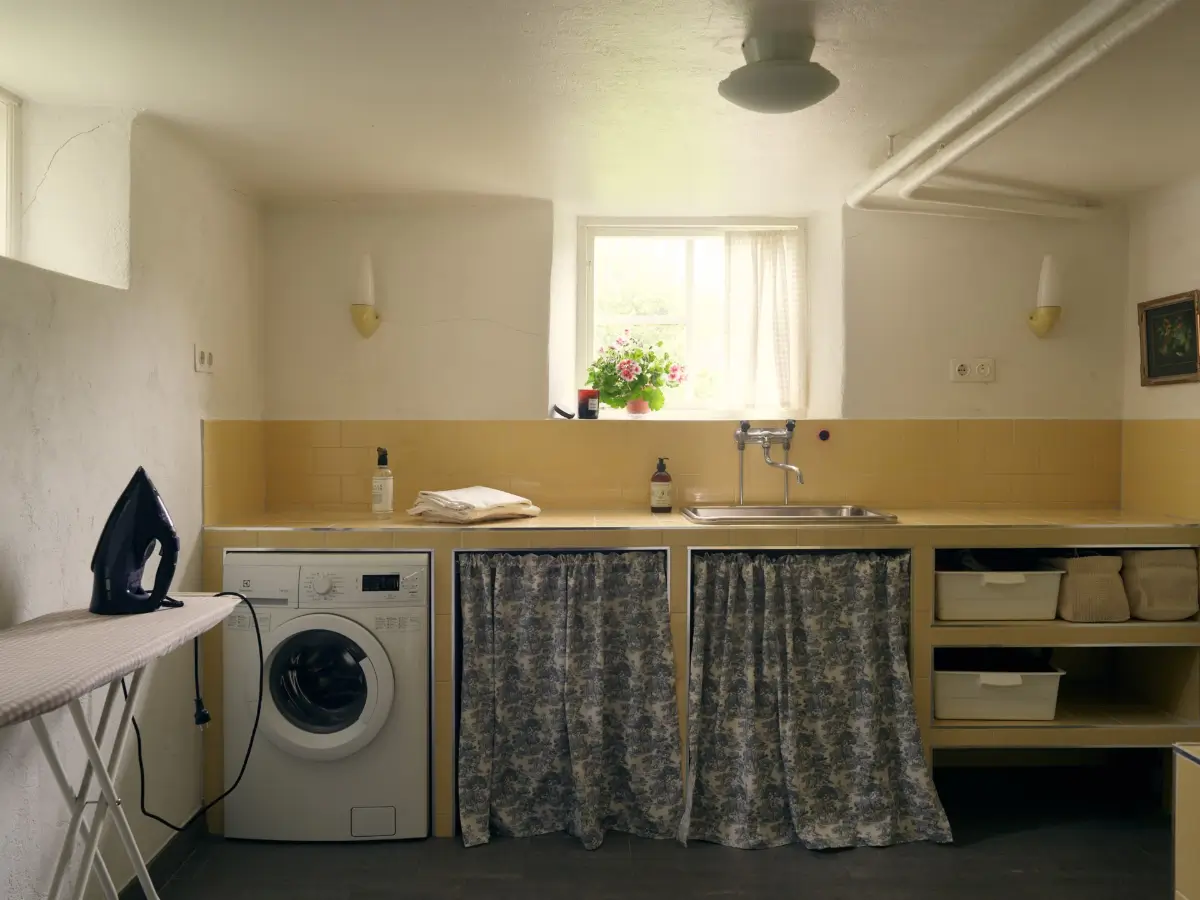 A Cheerful Color Palette in an Early 20th Century Villa in Stockholm 30 washroom yellow tiles