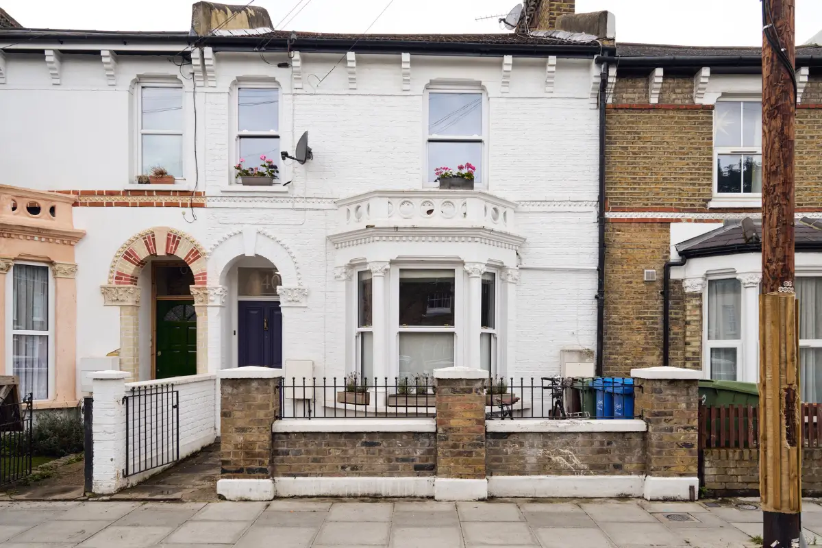 An Extended Victorian Apartment with Exposed Brick Walls 20 white painted brick facade An Extended Victorian Apartment with Exposed Brick Walls