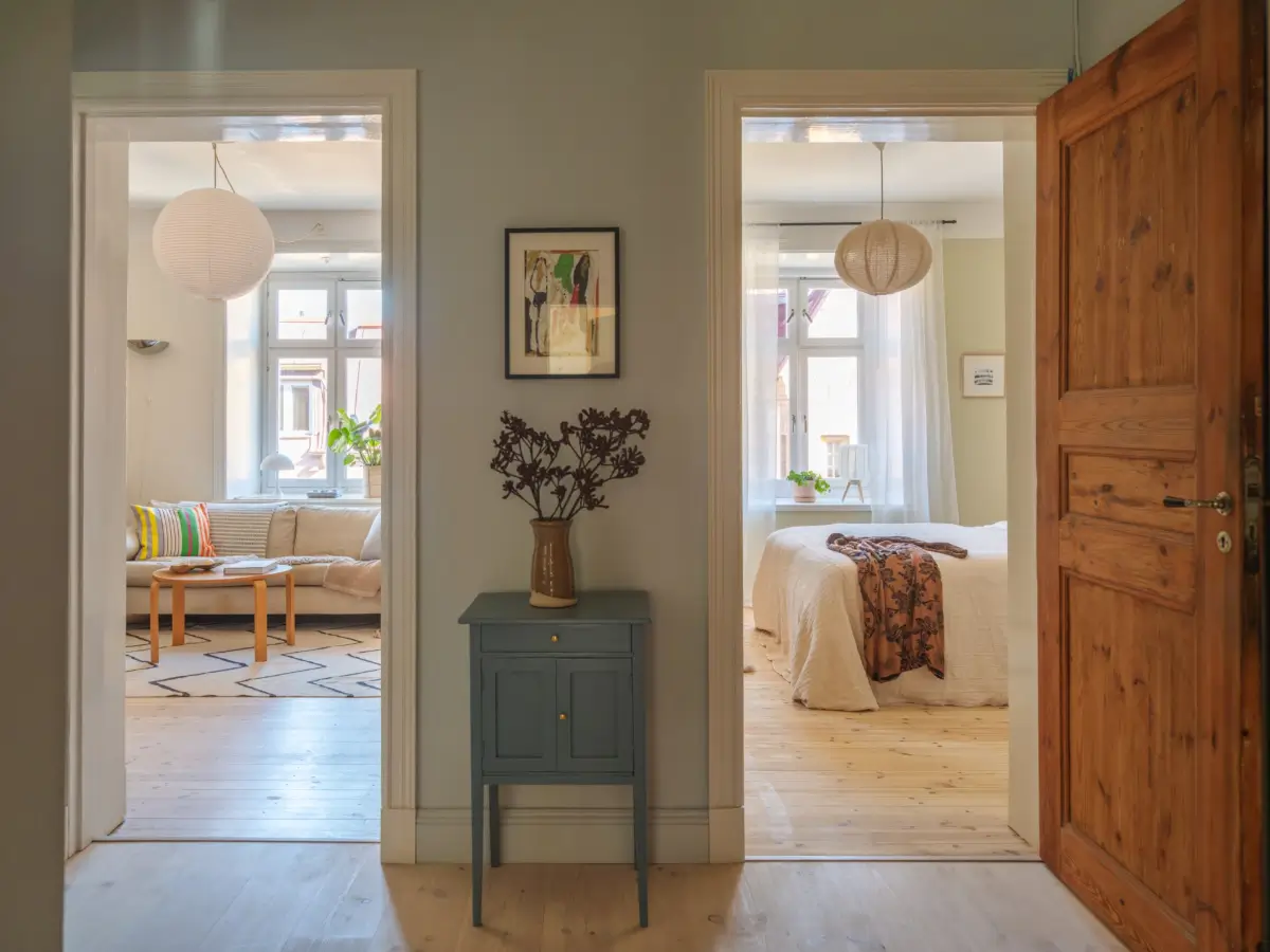 A Bright Apartment Where Historic Character Meets Contemporary Design 16 wooden bedroom door