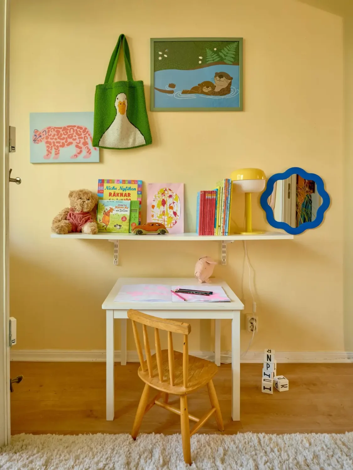 A Colorful and Cozy Midcentury Apartment in Stockholm 23 yellow kids bedroom desk