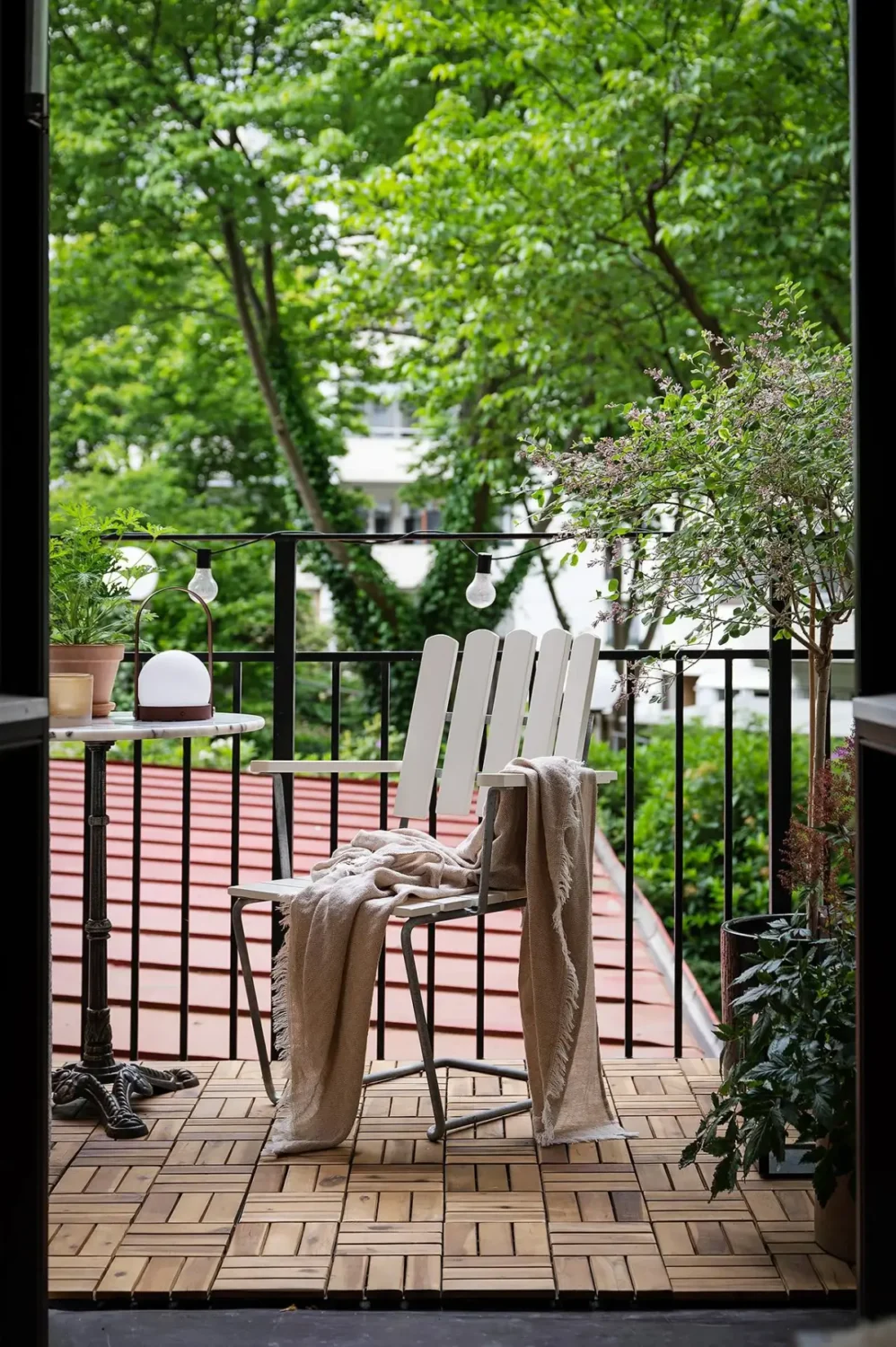 Warm Neutral Tones and Period Features in a Swedish Apartment 25 balcony