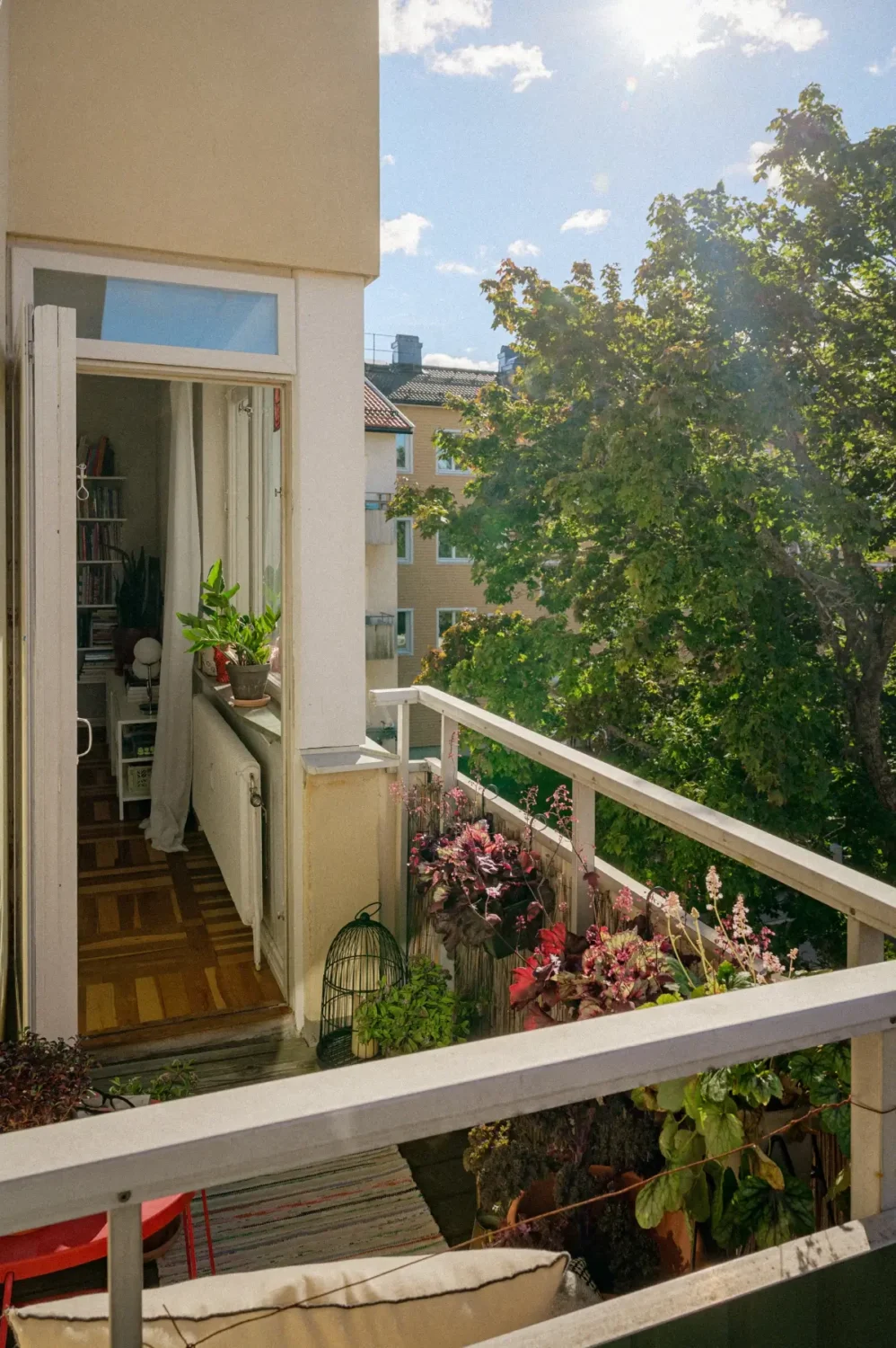 Green Tones and Period Elements in a 1940s Apartment 5 balcony midcentury apartment