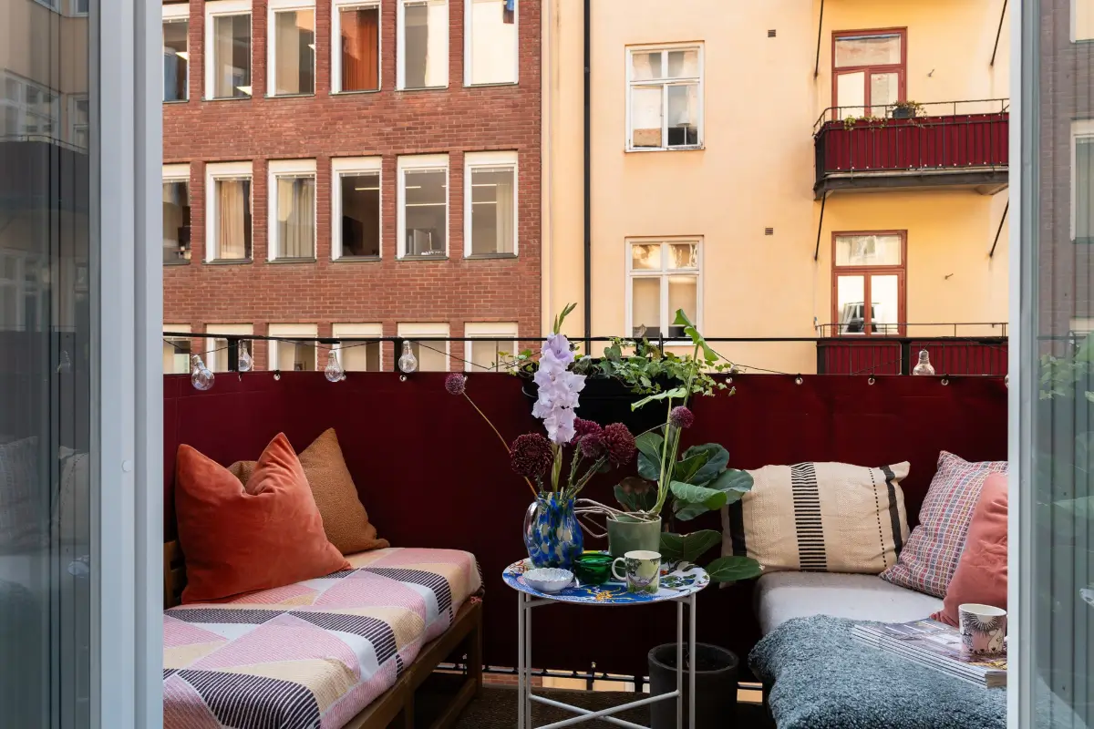 Neutral Tones and Period Character from the 1910s in a Stockholm Apartment 22 balcony with benches