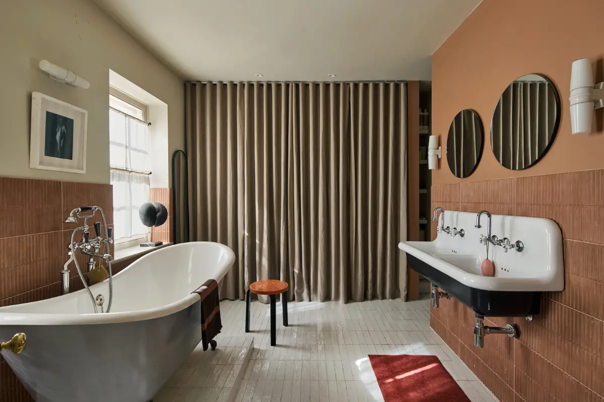 A deVOL Kitchen in a Beautiful Restored Georgian Townhouse in London 26 bathroom freestanding bath terracotta tile color nordroom