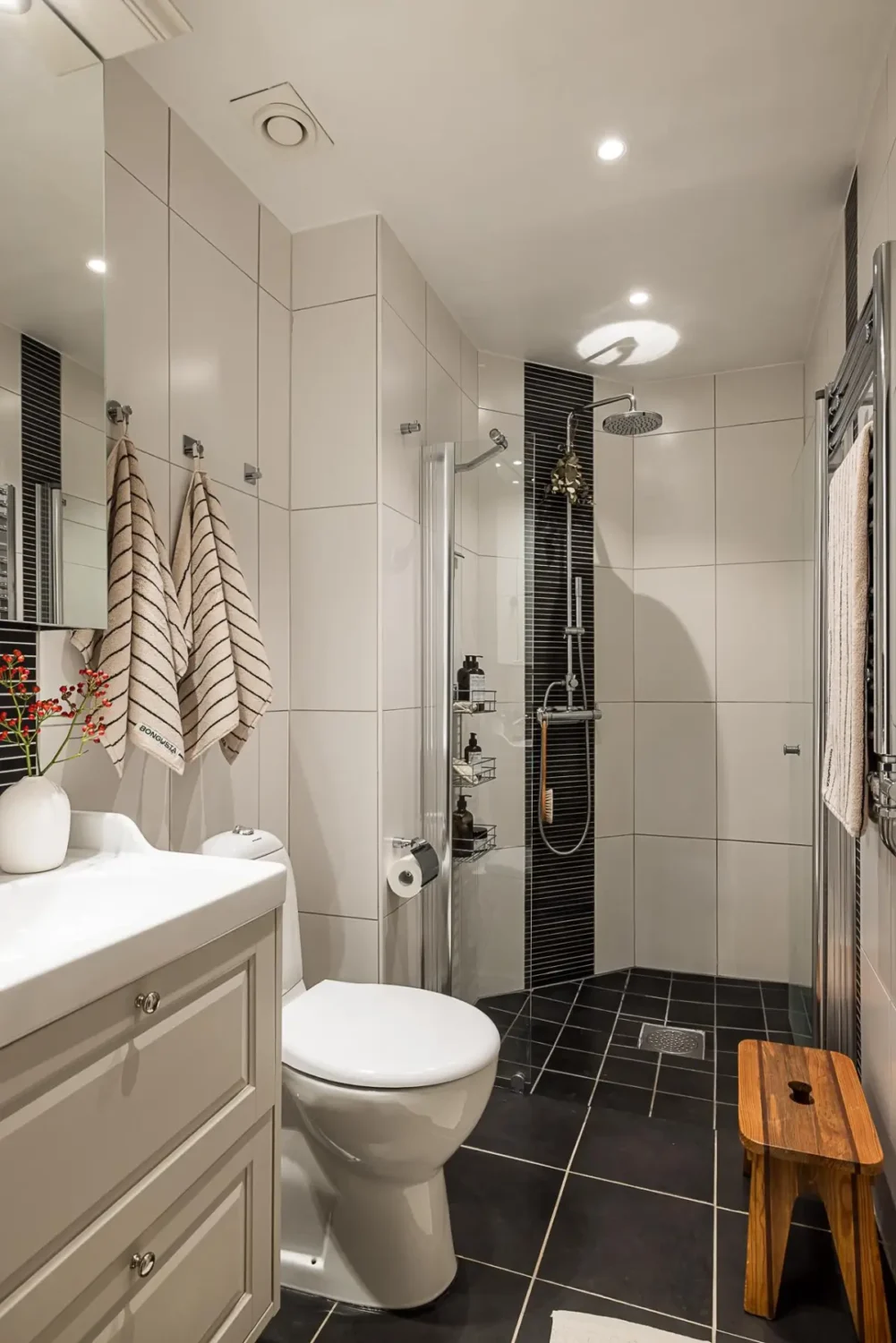 A Classic Renovated Apartment with a Social Light Green Kitchen 35 bathroom large white tiles