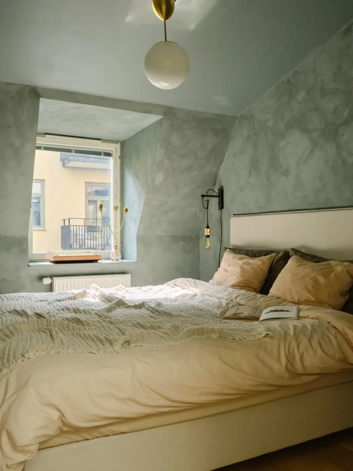 Former Stables Transformed into a Modern, Light House with Plaster Walls 17 bedroom blue-gray plaster walls