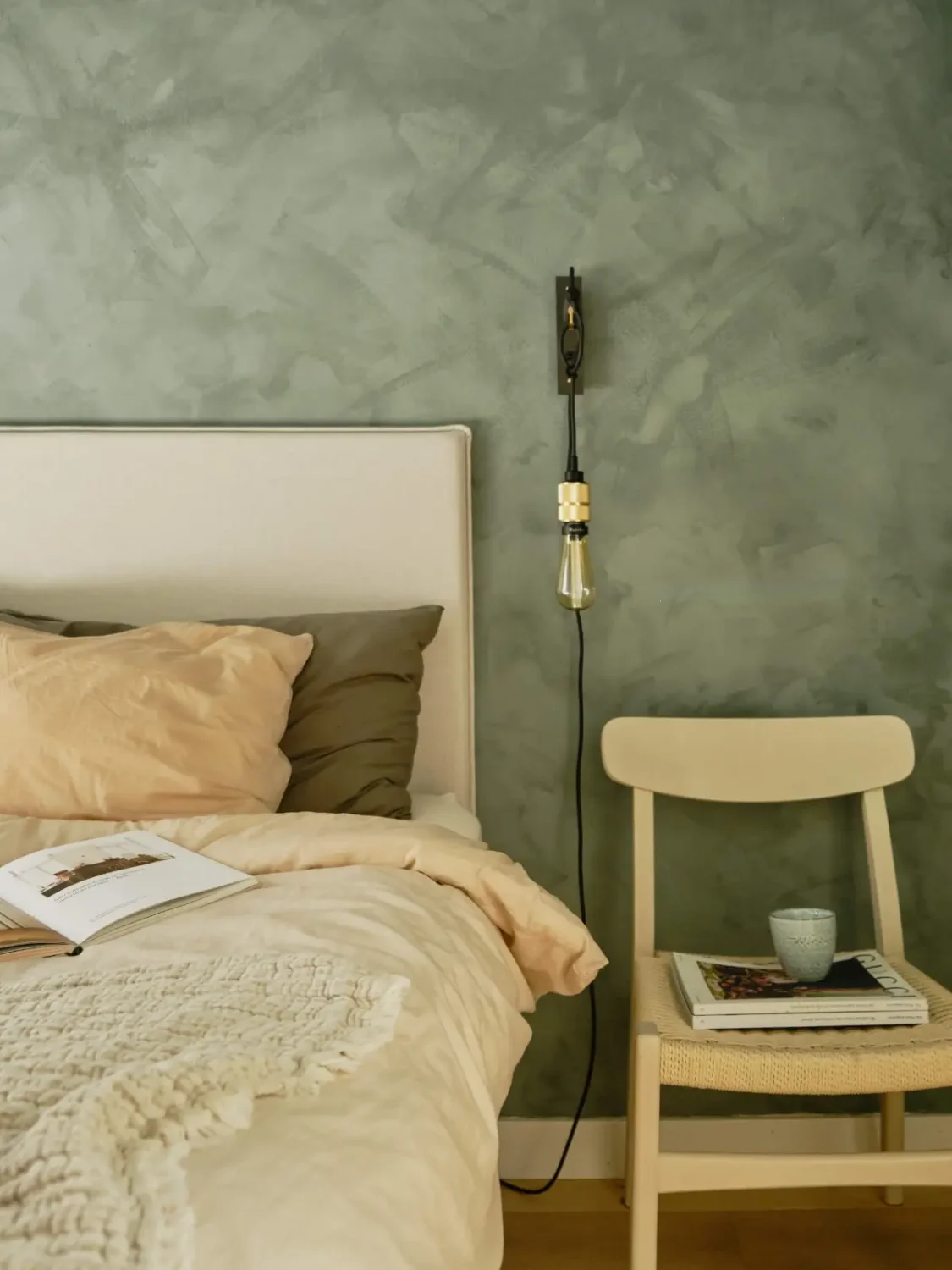Former Stables Transformed into a Modern, Light House with Plaster Walls 18 bedroom chair as nightstand