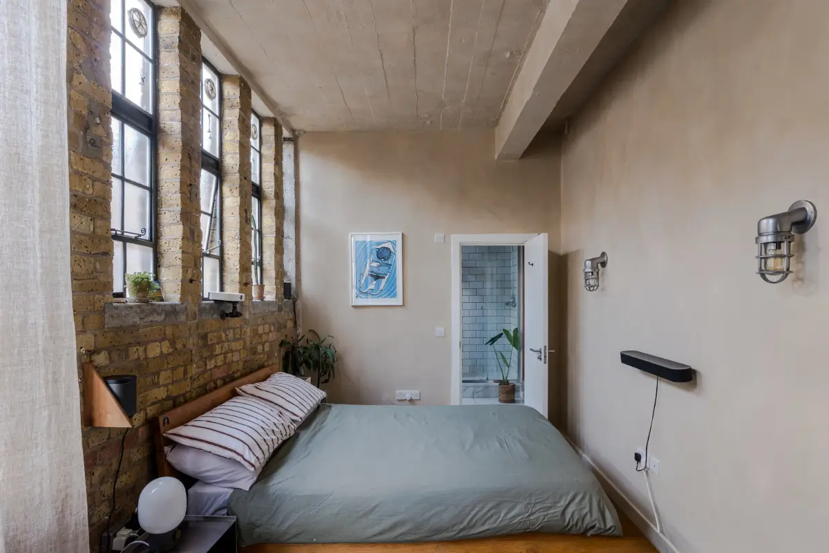 An Industrial London Apartment in a Former 1920s Shoe Factory 11 bedroom exposed brick feature wall